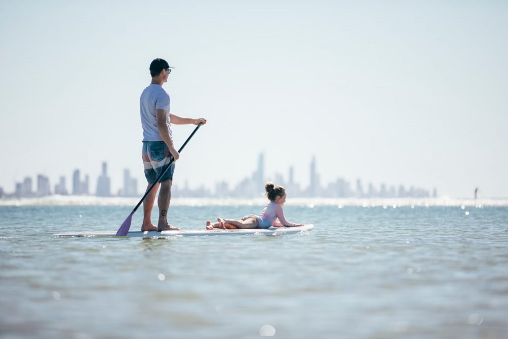 father-and-daughter-stand-up-paddle-boarding