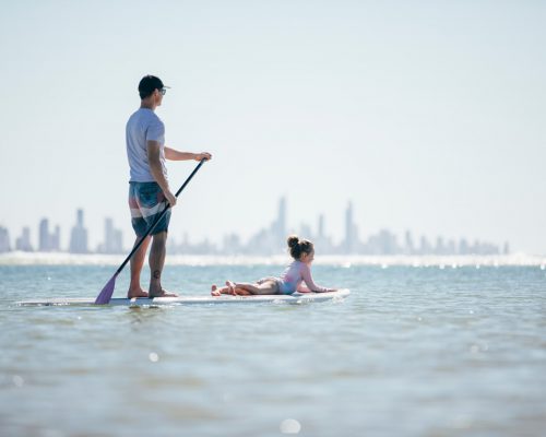 father-and-daughter-stand-up-paddle-boarding